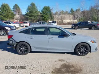 2022 Honda Civic Sport z VIN 2HGFE2F50NH601567, wystawiony jako IAAI lot #40880687 z przebiegiem 16 587 mil mil oraz . Historia ofert i sprzedaży dostępna na DreamBid. Obrazek 14.