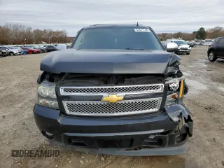 2014 Chevrolet Suburban LT with VIN 1GNSCJE01ER222961, listed as a Copart auction lot 84841744 with 168,131 mi miles and Salvage title. Bid and sale history available at DreamBid. Image 5.