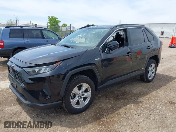 2021 Toyota RAV4 Hybrid LE with VIN 2T3L6RFV7MW011159, listed as a IAAI auction lot 42212998 with 104,626 mi miles and . Bid and sale history available at DreamBid. Image 2.