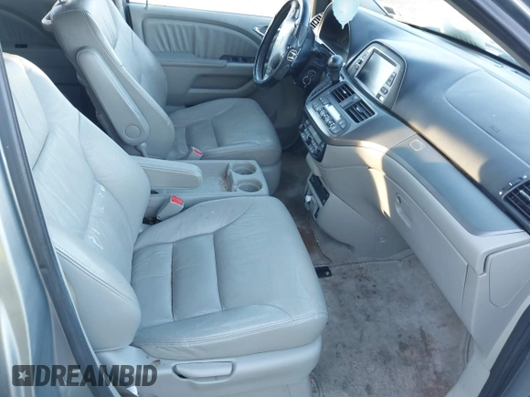 2007 Honda Odyssey EX-L z VIN 5FNRL387X7B081408, wystawiony jako IAAI lot #41143045 z przebiegiem 201 248 mil mil oraz . Historia ofert i sprzedaży dostępna na DreamBid. Obrazek 5.