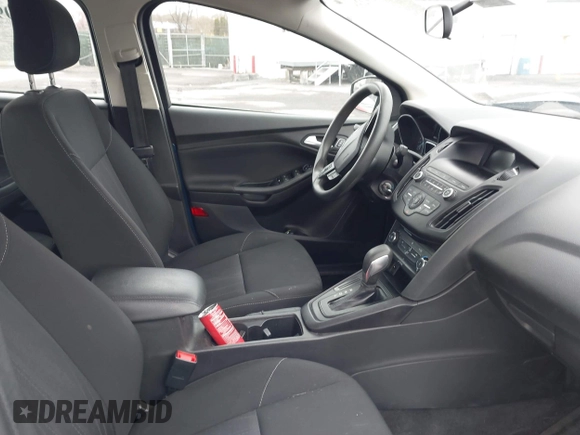 2018 Ford Focus SE z VIN 1FADP3F23JL200674, wystawiony jako IAAI lot #42009238 z przebiegiem 78 007 mil mil oraz . Historia ofert i sprzedaży dostępna na DreamBid. Obrazek 5.