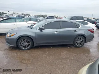 2018 Nissan Altima 2.5 SL with VIN 1N4AL3AP7JC184397, listed as a IAAI auction lot 41333050 with 110,206 mi miles. Bid and sale history available at carsss.com. Image 14.