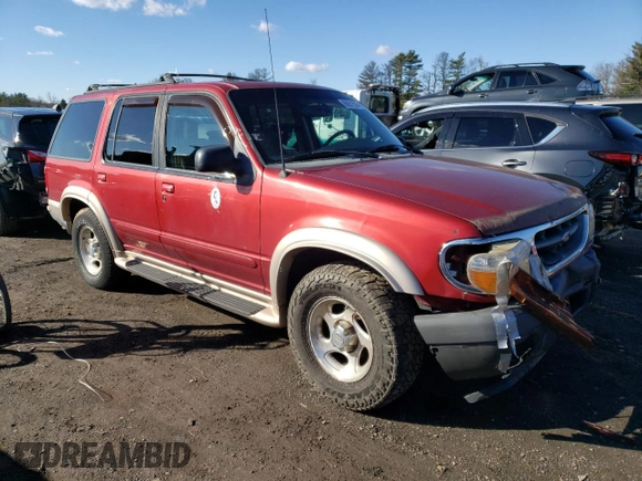1999 Ford Explorer XLT with VIN 1FMDU34E7XZA60386, listed as a Copart auction lot 86851594 with 218,592 mi miles and Salvage title. Bid and sale history available at DreamBid. Image 4.