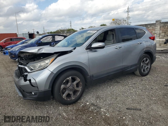 2017 Honda CR-V EX with VIN 7FARW1H58HE011809, listed as a Copart auction lot 48028085 with 63,510 mi miles and Salvage Title. Bid and sale history available at carsss.com. Image 1.