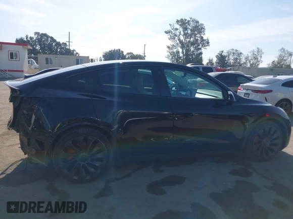 2021 Tesla Model Y Performance with VIN 5YJYGDEF1MF092889, listed as a IAAI auction lot 42076715 with 48,373 mi miles and . Bid and sale history available at DreamBid. Image 13.