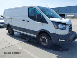 2020 Ford Transit Cargo with VIN 1FTBR1Y80LKA67205, listed as a IAAI auction lot 41805459 with 184,186 mi miles and . Bid and sale history available at DreamBid. Image 1.