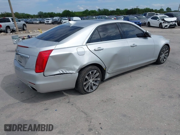2016 Cadillac CTS with VIN 1G6AR5SS9G0194126, listed as a IAAI auction lot 41972437 with 129,742 mi miles and . Bid and sale history available at DreamBid. Image 4.