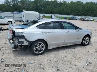 2015 Ford Fusion SE Hybrid with VIN 3FA6P0LU4FR301714, listed as a Copart auction lot 64370525 with 174,076 mi miles and Clean title. Bid and sale history available at DreamBid. Image 3.