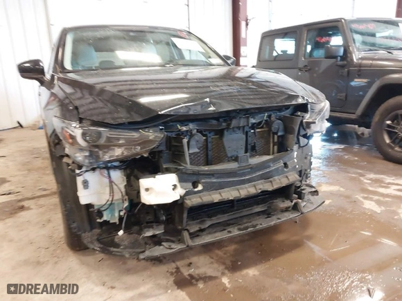 2017 Mazda CX-5 Grand Touring with VIN JM3KFBDLXH0206999, listed as a IAAI auction lot 41649611 with 73,382 mi miles. Bid and sale history available at carsss.com. Image 6.
