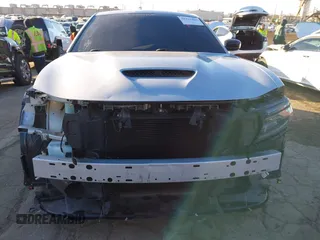 2020 Dodge Charger R/T with VIN 2C3CDXCT1LH219604, listed as a IAAI auction lot 41313469 with 58,665 mi miles and . Bid and sale history available at carsss.com. Image 13.