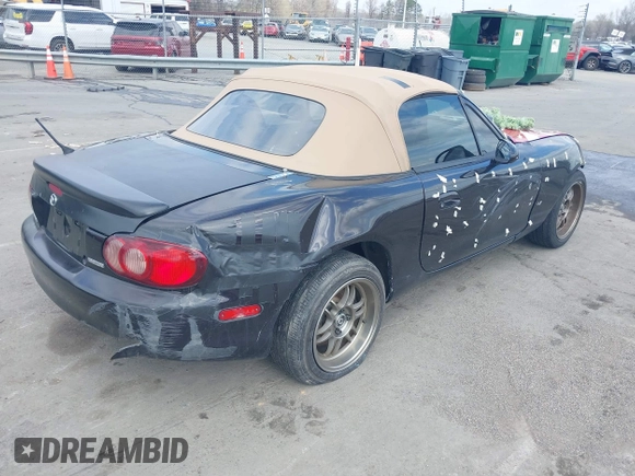 2004 Mazda MX-5 Miata LS with VIN JM1NB353040409951, listed as a IAAI auction lot 41848965 with 125,750 mi miles and . Bid and sale history available at DreamBid. Image 4.