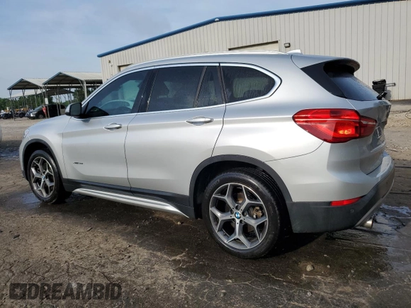 2017 BMW X1 xDrive28i z VIN WBXHT3Z34H4A53786, wystawiony jako Copart lot #54678575 z przebiegiem 86 312 mil mil oraz Szkoda całkowita • Salvage title. Historia ofert i sprzedaży dostępna na DreamBid. Obrazek 2.