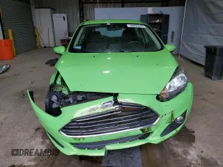 2015 Ford Fiesta SE z VIN 3FADP4EJ2FM215834, wystawiony jako Copart lot #58052045 z przebiegiem 99 842 mil mil oraz Czysty tytuł • Clean title. Historia ofert i sprzedaży dostępna na DreamBid. Obrazek 5.