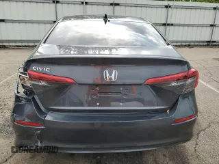 2024 Honda Civic EX z VIN 2HGFE1F76RH319547, wystawiony jako Copart lot #54358805 z przebiegiem 12 143 mil mil oraz Szkoda całkowita • Salvage title. Historia ofert i sprzedaży dostępna na DreamBid. Obrazek 6.