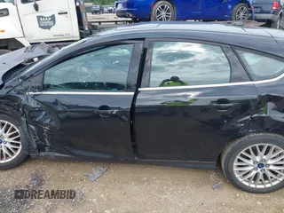 2014 Ford Focus Titanium with VIN 1FADP3N25EL194433, listed as a IAAI auction lot 42512912 with 105,355 mi miles and . Bid and sale history available at DreamBid. Image 14.
