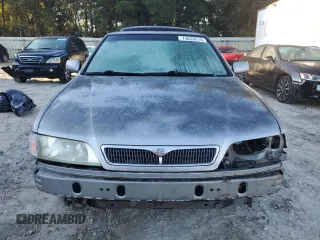 1999 Infiniti G20 z VIN JNKCP11A7XT020372, wystawiony jako Copart lot #73639514 z przebiegiem 174 467 mil mil oraz Szkody całkowita. Historia ofert i sprzedaży dostępna na DreamBid. Obrazek 5.