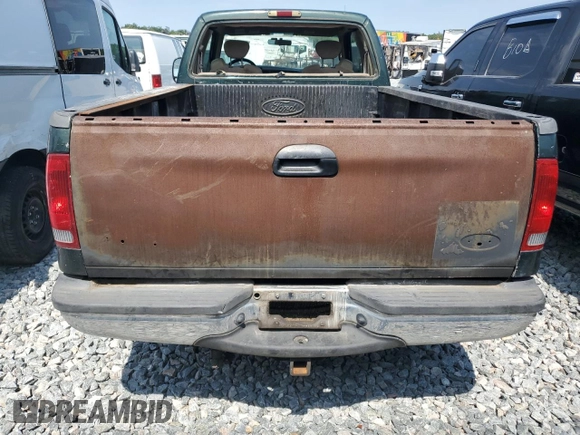 2002 Ford F-250 XL z VIN 1FTNX21F92EA00598, wystawiony jako Copart lot #58231845 z przebiegiem 178 784 mil mil oraz Szkoda całkowita • Salvage title. Historia ofert i sprzedaży dostępna na DreamBid. Obrazek 6.