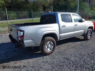 2023 Toyota Tacoma 4WD SR with VIN 3TMCZ5AN2PM626277, listed as a IAAI auction lot 39202148 with 2,440 mi miles. Bid and sale history available at carsss.com. Image 4.