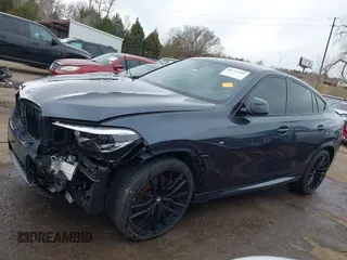 2022 BMW X6 xDrive40i z VIN 5UXCY6C08N9N30013, wystawiony jako IAAI lot #41772245 z przebiegiem 23 198 mil mil oraz . Historia ofert i sprzedaży dostępna na DreamBid. Obrazek 15.