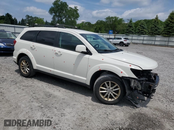 2017 Dodge Journey SXT with VIN 3C4PDDBG0HT542623, listed as a Copart auction lot 61628385 with 130,285 mi miles and Salvage title. Bid and sale history available at DreamBid. Image 4.