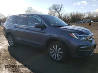 2022 Honda Pilot EX-L with VIN 5FNYF6H55NB023156, listed as a Copart auction lot 52269325 with 43,563 mi miles and Salvage title. Bid and sale history available at DreamBid. Image 4.