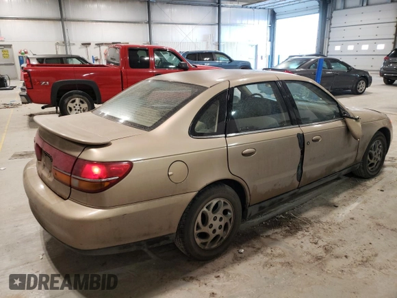 2002 Saturn LS z VIN 1G8JU54F62Y528998, wystawiony jako Copart lot #48390715 z przebiegiem 249 471 mil mil oraz Szkody całkowita. Historia ofert i sprzedaży dostępna na DreamBid. Obrazek 3.