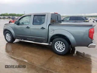 2016 Nissan Frontier SV with VIN 1N6AD0ER7GN766060, listed as a Copart auction lot 54343535 with 121,820 mi miles and Salvage title. Bid and sale history available at DreamBid. Image 2.