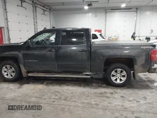 2015 Chevrolet Silverado 1500 LT with VIN 3GCUKREC4FG286409, listed as a IAAI auction lot 41150467 with 162,088 mi miles. Bid and sale history available at carsss.com. Image 14.