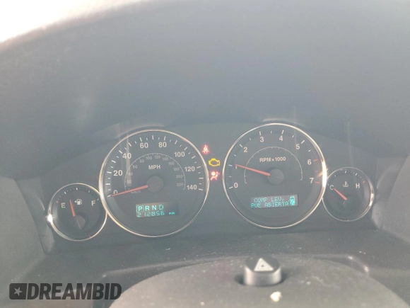 2007 Jeep Commander Sport z VIN 1J8HG48K27C527423, wystawiony jako Copart lot #63448765 z przebiegiem 212 856 mil mil oraz Szkoda całkowita • Salvage title. Historia ofert i sprzedaży dostępna na DreamBid. Obrazek 9.