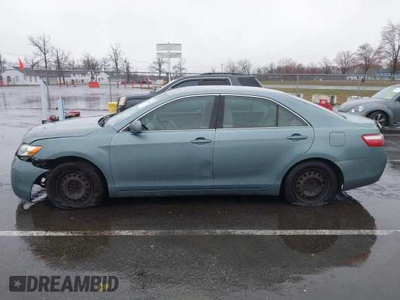 2007 Toyota Camry CE with VIN 4T1BE46K97U699024, listed as a IAAI auction lot 41811098 with 97,560 mi miles and . Bid and sale history available at DreamBid. Image 14.