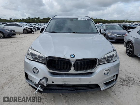 2015 BMW X5 xDrive50i with VIN 5UXKR6C51F0J74160, listed as a Copart auction lot 79337044 with 143,436 mi miles and Salvage title. Bid and sale history available at DreamBid. Image 5.