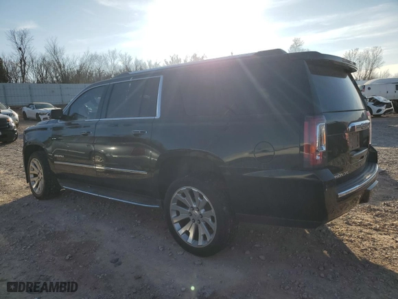 2016 GMC Yukon XL Denali with VIN 1GKS1HKJXGR443700, listed as a Copart auction lot 85327284 with 115,015 mi miles and Salvage Title. Bid and sale history available at carsss.com. Image 2.