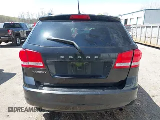 2013 Dodge Journey American Value with VIN 3C4PDCAB8DT577064, listed as a IAAI auction lot 42087623 with 143,044 mi miles and . Bid and sale history available at DreamBid. Image 16.