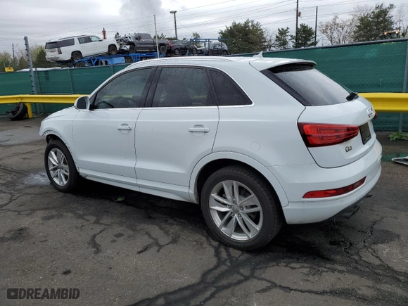 2016 Audi Q3 Premium Plus with VIN WA1BFCFS9GR005327, listed as a Copart auction lot 50389585 with 105,616 mi miles and Salvage Title. Bid and sale history available at carsss.com. Image 2.