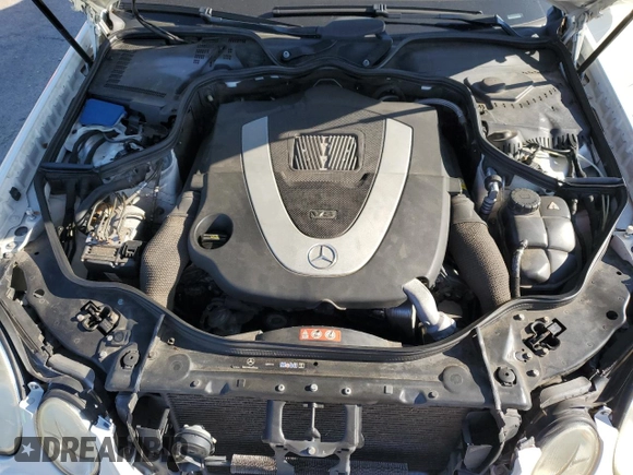 2007 Mercedes-Benz E 550 with VIN WDBUF72X37B021084, listed as a Copart auction lot 48695235 with 119,538 mi miles and Salvage Title. Bid and sale history available at DreamBid. Image 11.