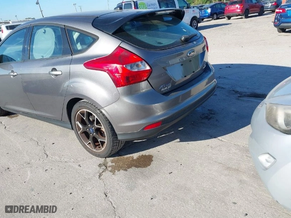 2013 Ford Focus SE with VIN 1FADP3K23DL249898, listed as a IAAI auction lot 41840265 with 112,800 mi miles. Bid and sale history available at carsss.com. Image 3.