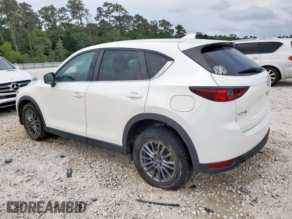 2020 Mazda CX-5 Touring z VIN JM3KFACM6L0787687, wystawiony jako Copart lot #57639555 z przebiegiem 91 219 mil mil oraz Szkoda całkowita • Salvage title. Historia ofert i sprzedaży dostępna na DreamBid. Obrazek 2.