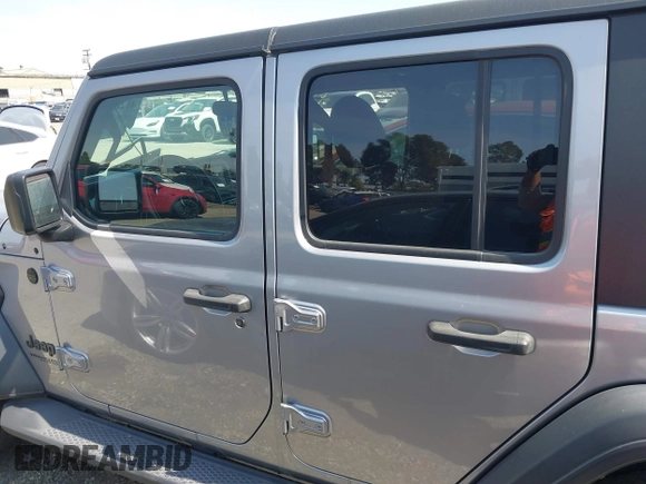 2021 Jeep Wrangler Unlimited Sport Altitude with VIN 1C4HJXDGXMW662493, listed as a IAAI auction lot 41288957 with 64,808 mi miles and . Bid and sale history available at DreamBid. Image 15.