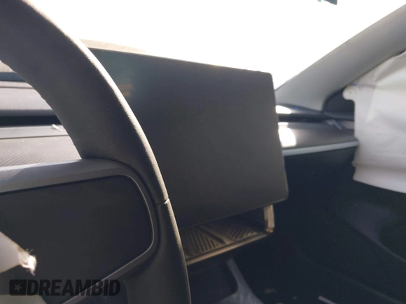 2022 Tesla Model 3 Performance with VIN 5YJ3E1EC3NF194197, listed as a IAAI auction lot 41825401 with Not Provided miles and . Bid and sale history available at DreamBid. Image 7.