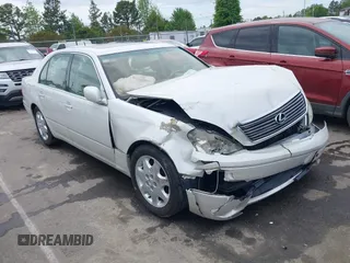 2001 Lexus LS 430 with VIN JTHBN30F110026221, listed as a IAAI auction lot 42022976 with 142,418 mi miles. Bid and sale history available at carsss.com. Image 1.