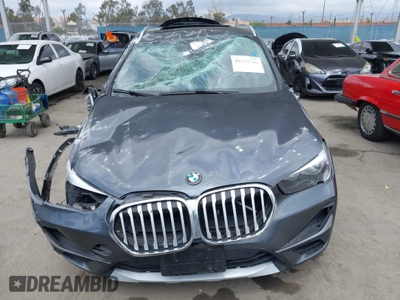 2021 BMW X1 xDrive28i with VIN WBXJG9C03M3M80011, listed as a IAAI auction lot 42137781 with 132,969 mi miles. Bid and sale history available at carsss.com. Image 12.