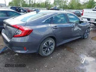 2018 Honda Civic EX-T z VIN 2HGFC1F34JH643975, wystawiony jako IAAI lot #42209799 z przebiegiem 58 684 mil mil oraz . Historia ofert i sprzedaży dostępna na DreamBid. Obrazek 4.