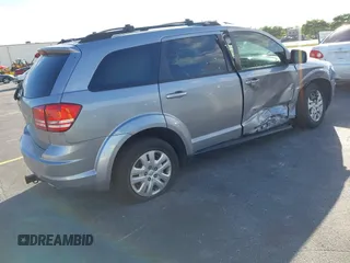 2016 Dodge Journey SE with VIN 3C4PDCAB2GT194810, listed as a IAAI auction lot 41559149 with 104,551 mi miles and . Bid and sale history available at DreamBid. Image 4.