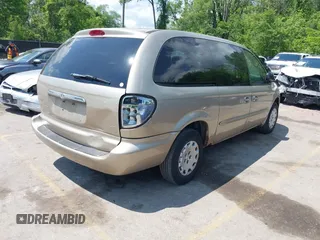 2003 Chrysler Town & Country LX z VIN 2C4GP44R23R375215, wystawiony jako IAAI lot #42172062 z przebiegiem 207 509 mil mil oraz . Historia ofert i sprzedaży dostępna na DreamBid. Obrazek 4.