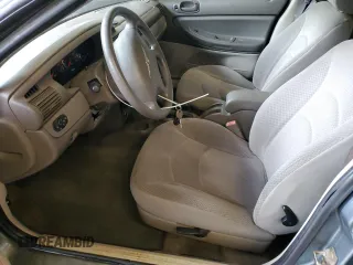 2006 Chrysler Sebring z VIN 1C3EL46X66N183607, wystawiony jako Copart lot #56274025 z przebiegiem 174 917 mil mil oraz Szkoda całkowita • Salvage title. Historia ofert i sprzedaży dostępna na DreamBid. Obrazek 7.