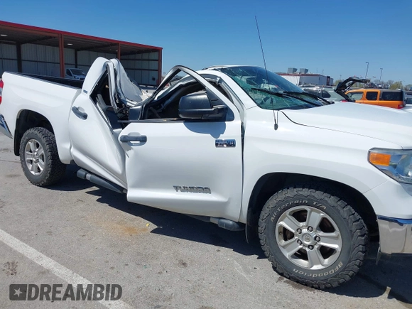 2014 Toyota Tundra 4WD Truck SR5 with VIN 5TFDW5F1XEX390763, listed as a IAAI auction lot 41973864 with 117,369 mi miles. Bid and sale history available at carsss.com. Image 1.