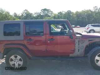 2007 Jeep Wrangler Unlimited Sahara с VIN 1J8GA59187L211825, выставлен на аукционе IAAI как лот 42313099 с пробегом 107 554 миль миль и . История ставок и продаж доступна на DreamBid. Изображение 14.