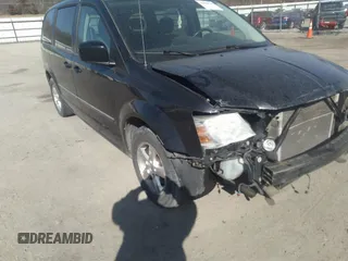 2009 Dodge Grand Caravan SXT z VIN 2D8HN54169R539294, wystawiony jako IAAI lot #41804315 z przebiegiem 175 090 mil mil oraz . Historia ofert i sprzedaży dostępna na DreamBid. Obrazek 6.