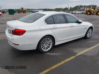 2015 BMW 5 Series 528i with VIN WBA5A5C5XFD516999, listed as a IAAI auction lot 41195184 with 131,187 mi miles. Bid and sale history available at carsss.com. Image 4.