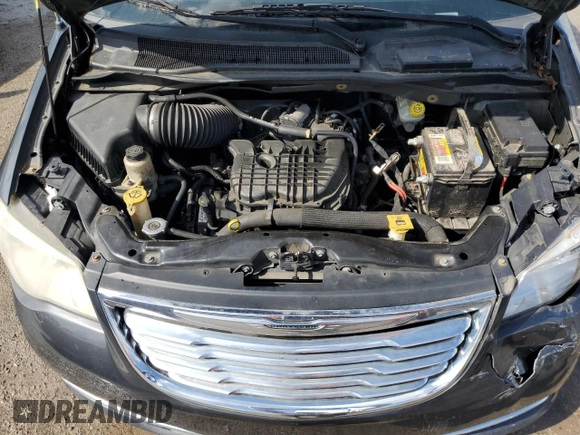 2012 Chrysler Town & Country Touring z VIN 2C4RC1BG7CR353263, wystawiony jako Copart lot #64316454 z przebiegiem 140 132 mil mil oraz Szkoda całkowita • Salvage title. Historia ofert i sprzedaży dostępna na DreamBid. Obrazek 12.